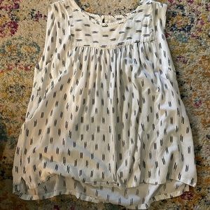 Black and white sleeveless blouse